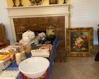 Cookbooks, artwork and misc items from the kitchen. 