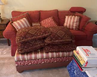 Den sofa and large ottoman. Lots of pillows