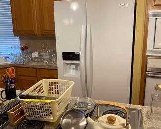 Frigidaire white refrigerator. Less than a year old. 