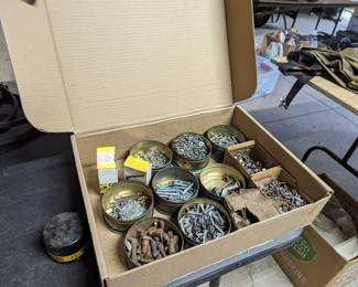 Several boxes and pails of miscellaneous screws, nails, nuts, bolts