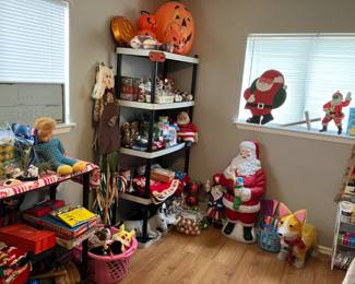 So much holiday decor!! Christmas and Halloween blow molds