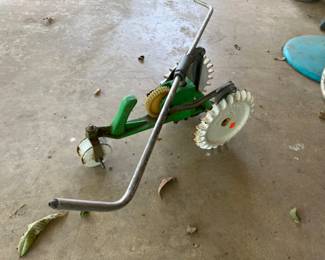 Vintage tractor sprinkler. 