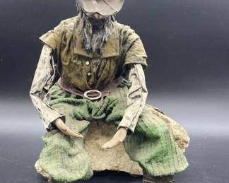 Vintage paper mache miner figurine