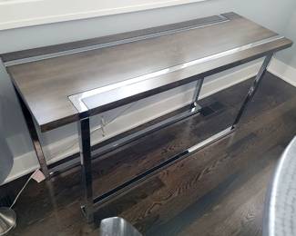 Modern chrome and wood console table 52"w x 17"d x 28"h. $80