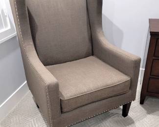 Modern studded wing chair. 29"w x 40"h x 28.5"d So classy and elegant! $200 excellent condition