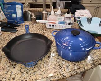 3 Le Creuset blue skillets and 2 Dutch ovens