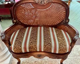 53. Carved Kidney Shaped Loveseat w/ Cane Back & Seat (39" x 20" x 38")