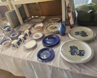 Lots of dishes, including Blue Willow and Pfaltzgraff.