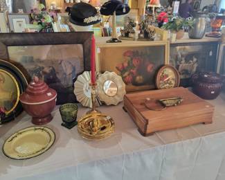 Lots of framed and unframed art, home decor items, mirrors, etc. 