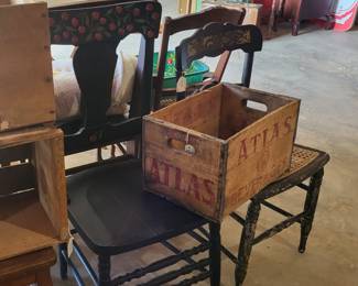 Hand-painted chairs, old wood crates....