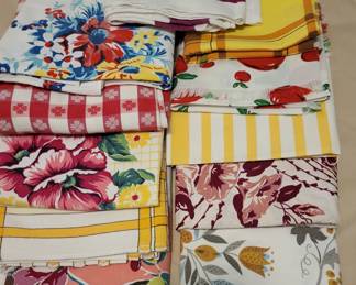 Great vintage table cloths, napkins, dish towels.  If you like vintage linens, we have SO MUCH!  Bark cloth, crochet doilies, handkerchiefs, chenille bedspreads, feedsack fabric, quilts, quilt tops, cut quilt pieces, quilt books, quilt patterns, feedsack dress, vintage children's clothing items...