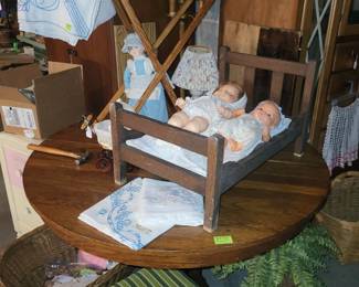 Old toddler bed, child's ironing board, vintage dolls and doll clothes, LOTS of old doll house furniture. 