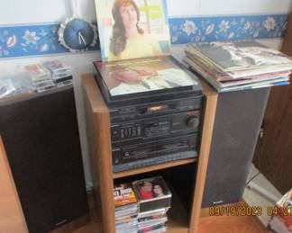 Stereo with many CDs and LPs