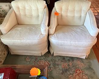 Pair of cream swivel chairs—great shape 