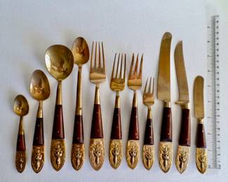 Two huge boxes (over 150 pieces) of Thai bronze and rosewood flatware from the ‘50s