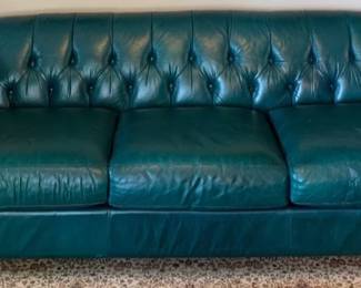 Green leather sofa