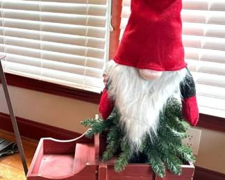 Large gnome in wagon