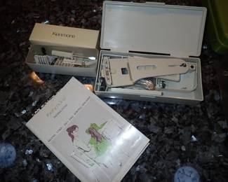 KENMORE SEWING MACHINE AND ATTACHMENTS