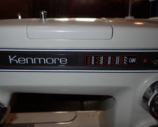 KENMORE SEWING MACHINE AND ATTACHMENTS