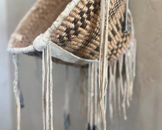 Apache burden basket with buckskin and tin