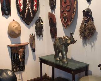 An outstanding collection of African arts and decor including wood carvings, statues, masks and ceramics.