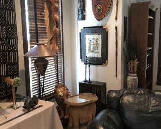 An outstanding collection of African arts and decor including wood carvings, statues, masks and ceramics.