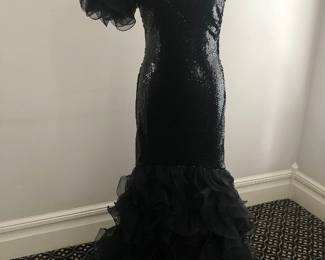 Gorgeous collection of ladies elegant and sophisticated evening and party wear.