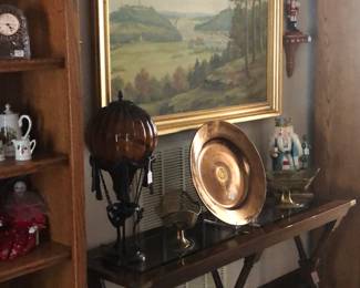 Lots of framed original art and prints along with all kinds of beautiful decor.