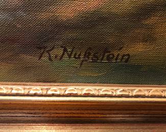 Original autumn landscape painting depicting pine-covered hills overlooking a town with red-roofed buildings, artist signed.