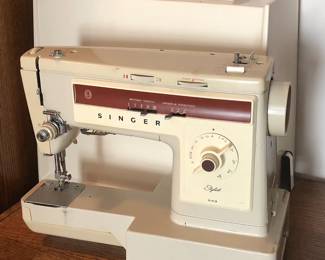 Singer Stylist 543 Model sewing machine with original case. 
