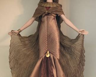 Impressive collection of Franklin Heirloom hand-painted porcelain dolls including this Cleopatra figure.