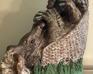 Drunken Texan armadillo with beer bottle.