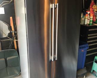 2022 Maytag stainless steel side-by-side refrigerator.