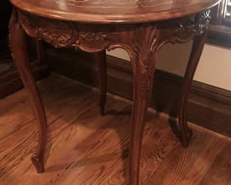 Vintage Louis XV style center table with inlaid marquetry.