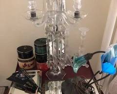 luster with crystal prisms, collectible hat boxes with hats