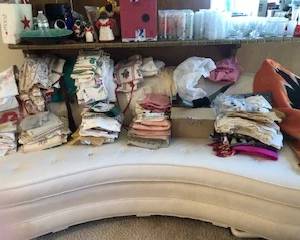 vintage linens on MCM sofa
