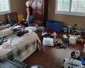 The last room to prep. 3 bins full of more clothing and bins full of brand new makeup, plus a walk-in closet full of ladies and men's clothing and accessories.
