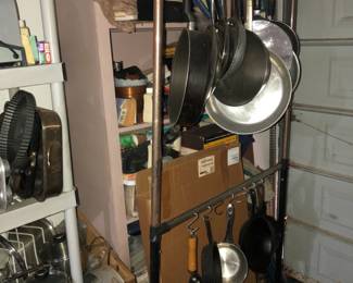 Pots, pans, kitchen items in garage