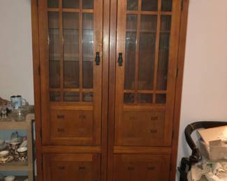 $160 ($80 each cabinet) Double door cabinet with glass shelves and storage underneath