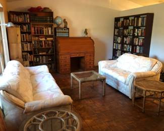Living room furniture.  Really nice and clean Florida style sofa and loveseat with bamboo trim.  Bamboo lamp tables.  Rattan glass top tables.