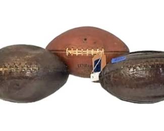 Three Vintage Footballs