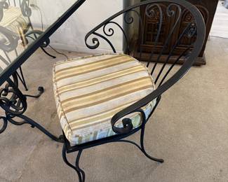 Vintage black wrought iron chairs
