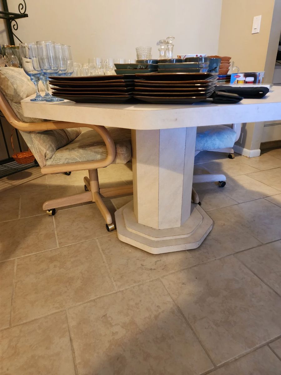 Dining room table with 4 swivel chairs!  