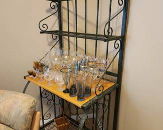 Open bakers rack.  Stylish and functional will enhance the decor your home.