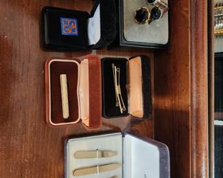 Designer cuff links and tie bars.  A great way to jazz up any dress shirt.  