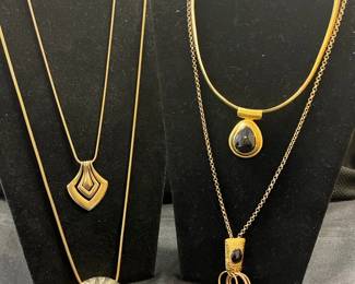 4 Gold Toned Necklaces