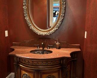 60" wide marble vanity with copper sink.
