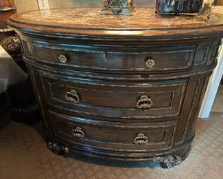 Marge Carson oval night stand 44" wide, 25" deep, 33" tall.