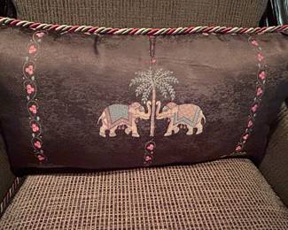 upholstered side arm chairs with elephant motifs by Clayton Marcus