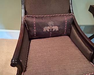 upholstered side arm chairs with elephant motifs by Clayton Marcus